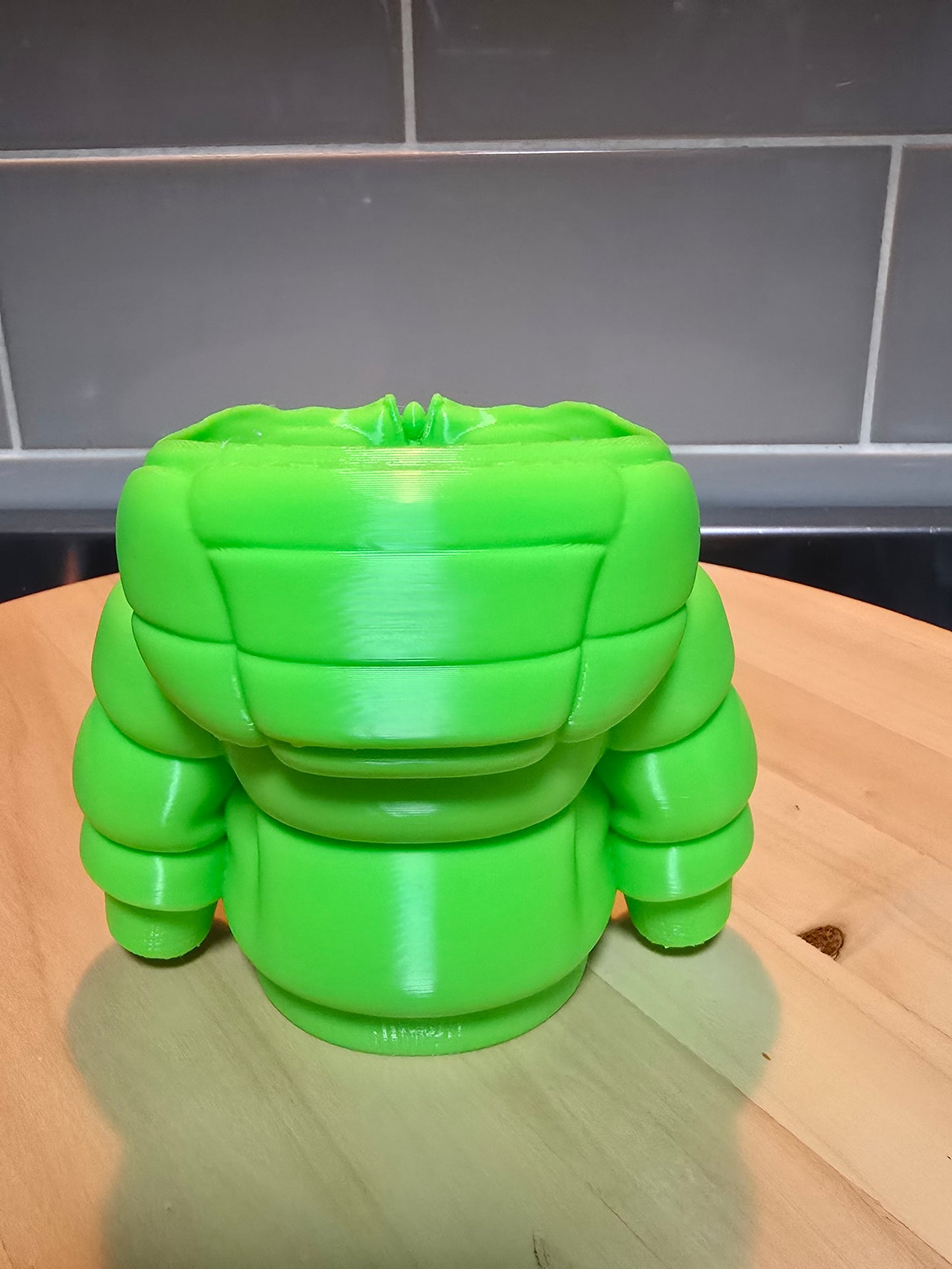 Puffer jacket pen holder
