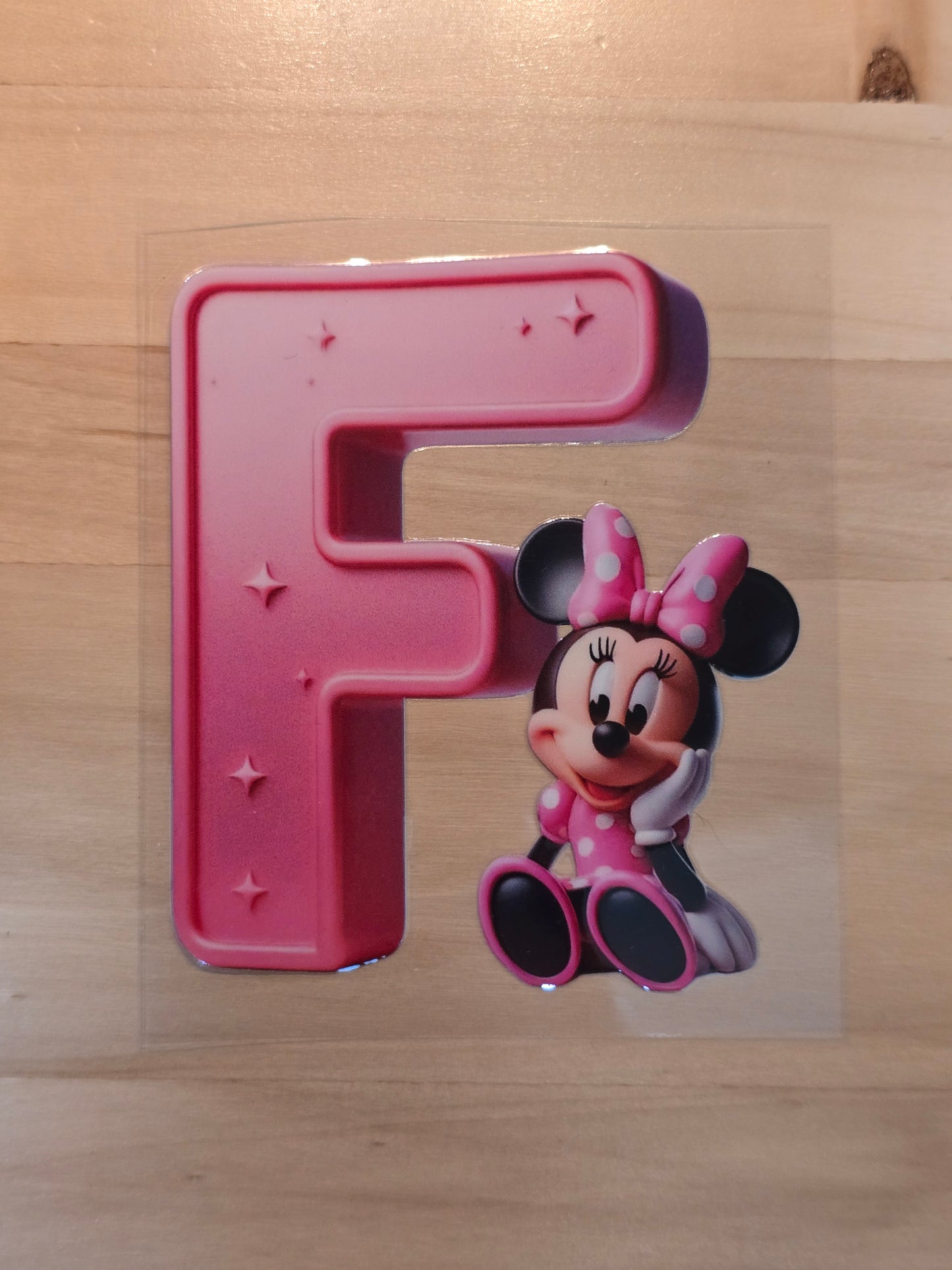 Pink letter 'F' with Minnie Mouse
