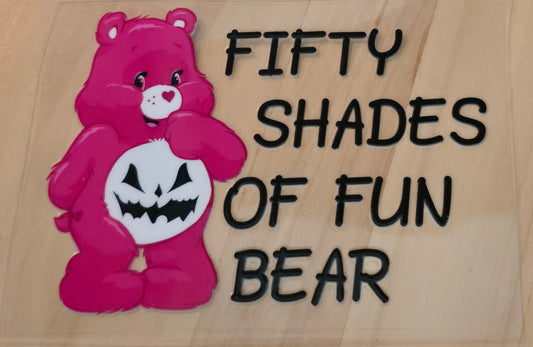 Hot pink care bear with the words Fifty Shades of Fun Bear
