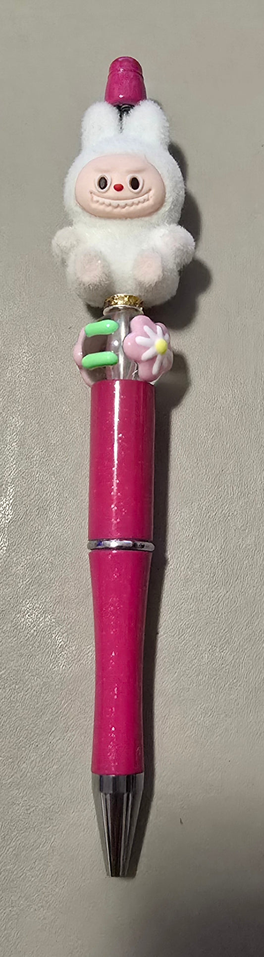 White Labubu pink pen